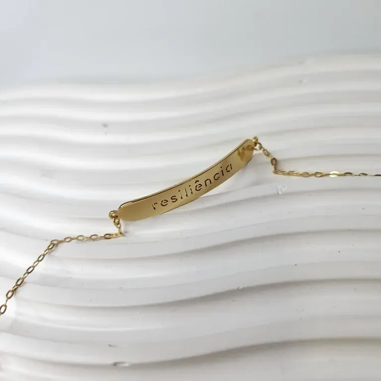PULSEIRA OURO PLACA RESILIÊNCIA