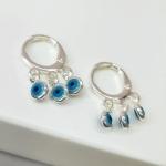 BRINCO ARGOLA PRATA TRANQ OLHO