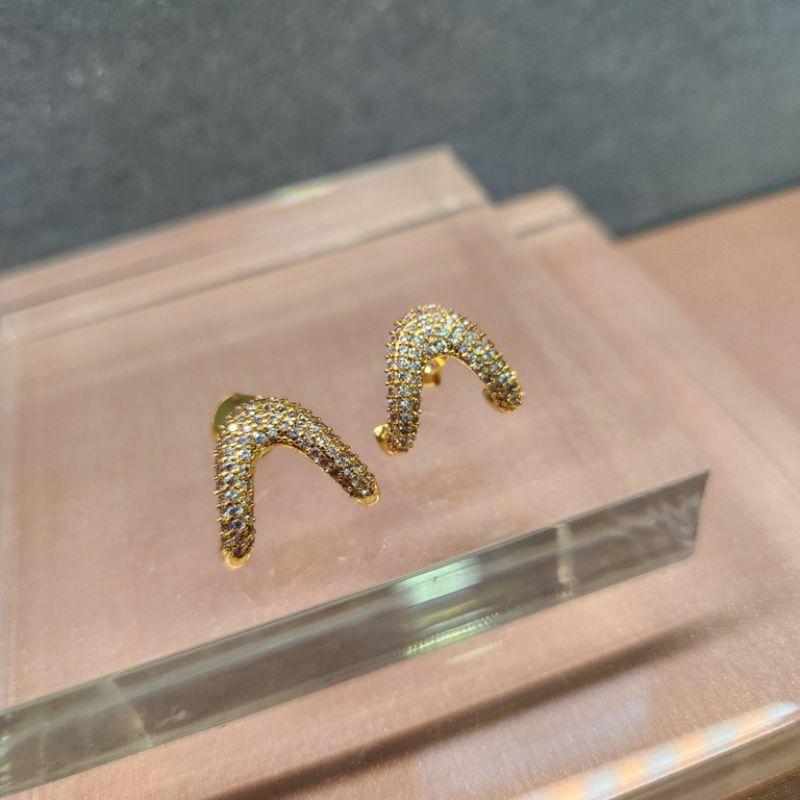 BRINCO OURO EAR HOOK 2 GARRAS ZIRC