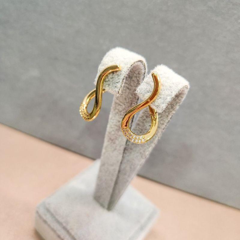 BRINCO OURO OITO ZIRC