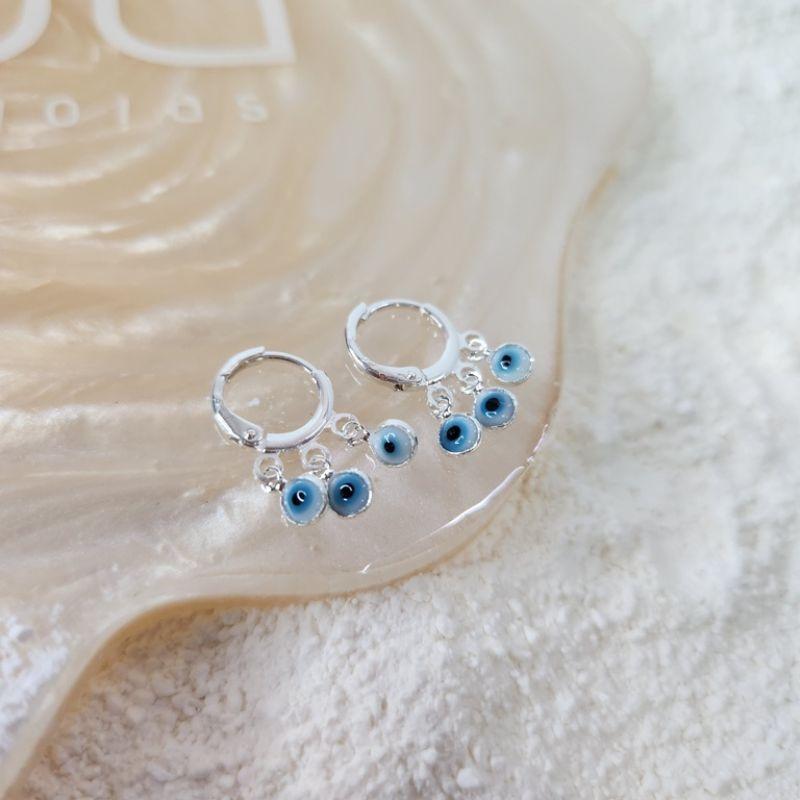 BRINCO PRATA 3 OLHO GREGO