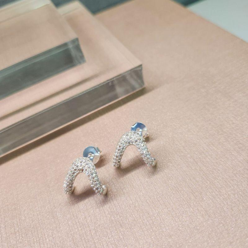 BRINCO PRATA EAR HOOK 2 GARRAS ZIRC