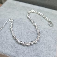 PULSEIRA PRATA ELOS DESENHADOS	
